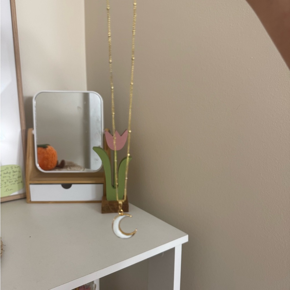 Gold Necklace with White Crescent Pendant